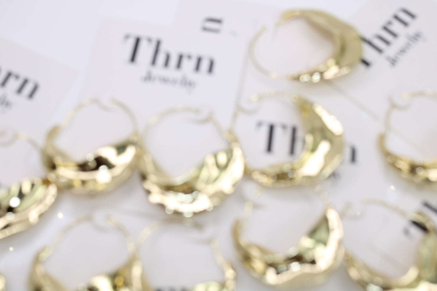 Gold Silhouette Hoops