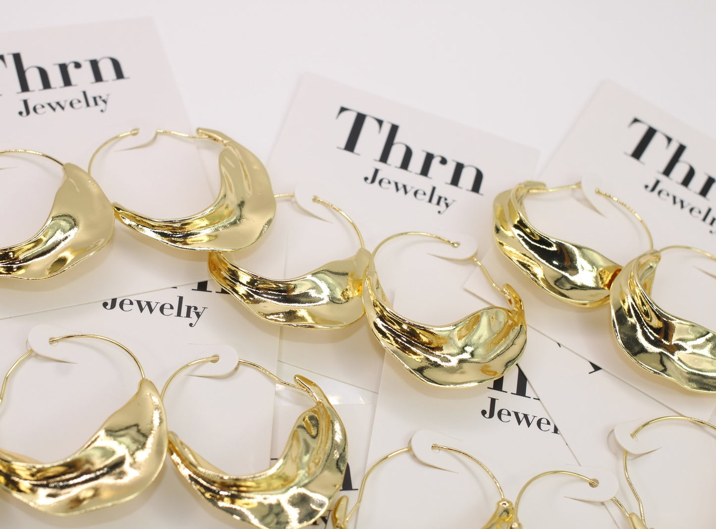 Gold Silhouette Hoops