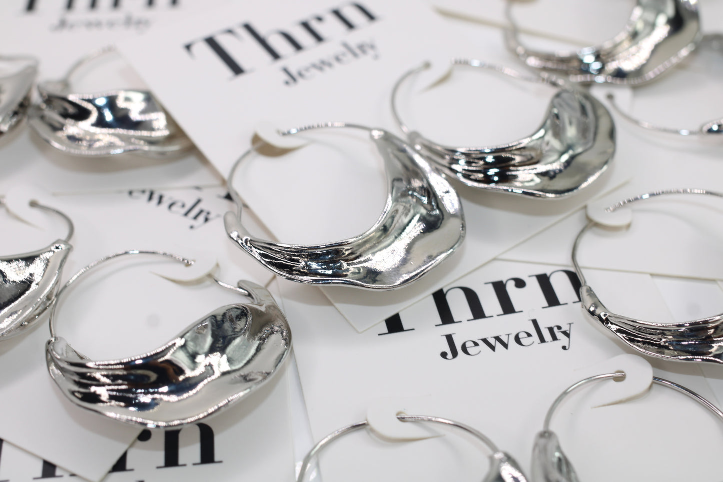 Silver Silhouette Hoops